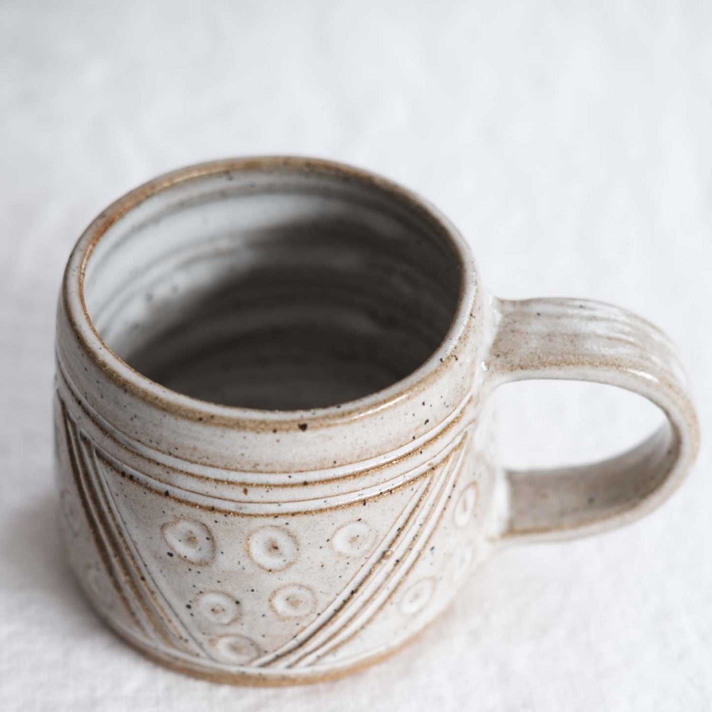 White Carved Triangle Mug