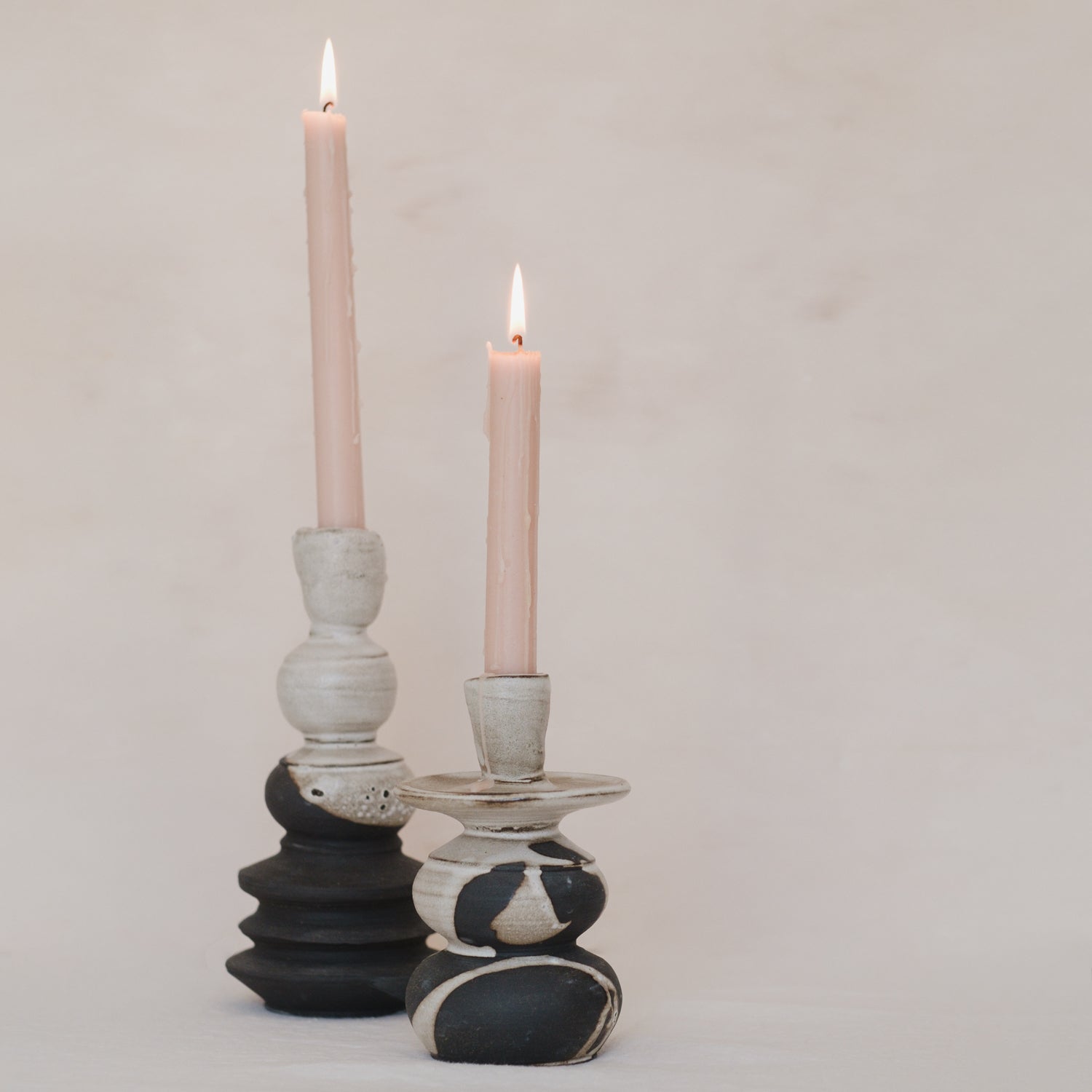 Two earthy two toned ceramic candle holders handmade to hold tapered candles